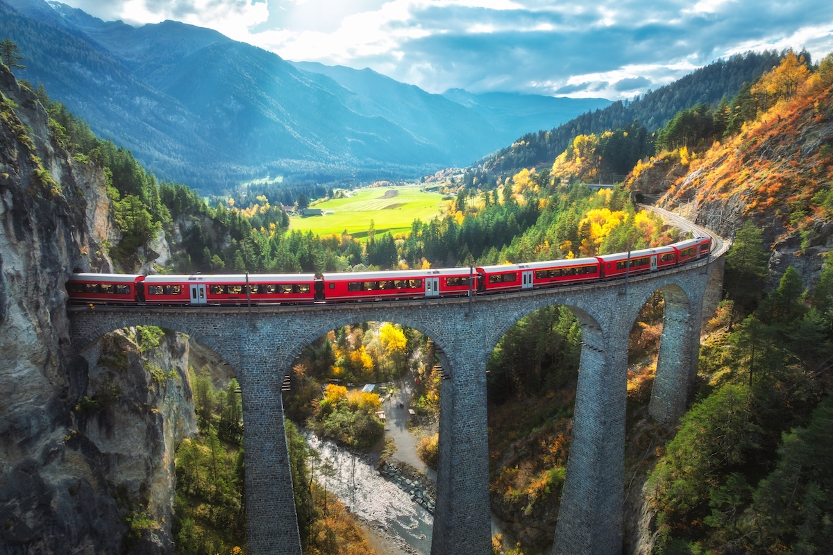 Aerial,View,Of,Modern,Red,Train,On,Landwasser,Viaduct,In
